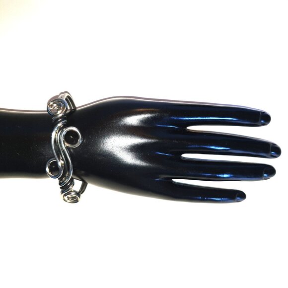 2.5'' Handcrafted Silver Wave Cuff Bracelet with Black Wire Accents Swirl Design - Picture 4 of 11